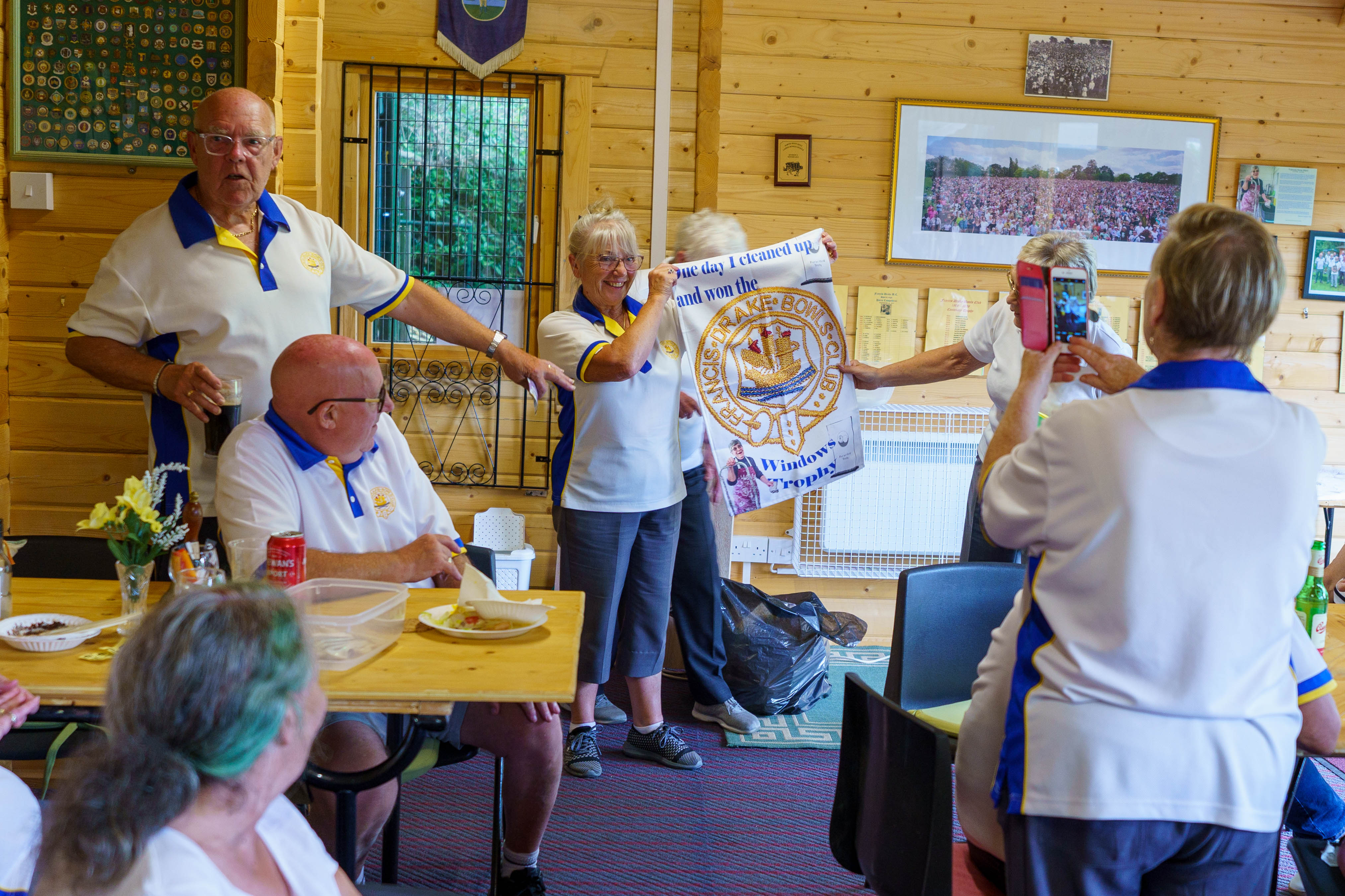 Francis Drake Bowls Club, Hilly Fields, Brockley, SE4 1QE. Sue showing the cleaning cloth which she gets to keep.